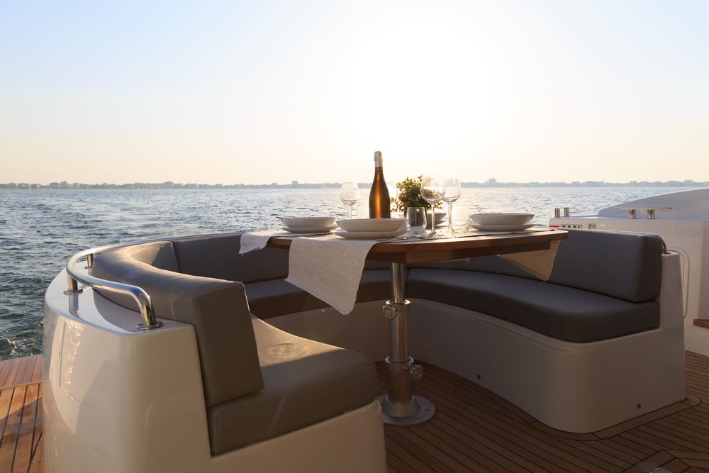 Romantic couple on yacht at sunset